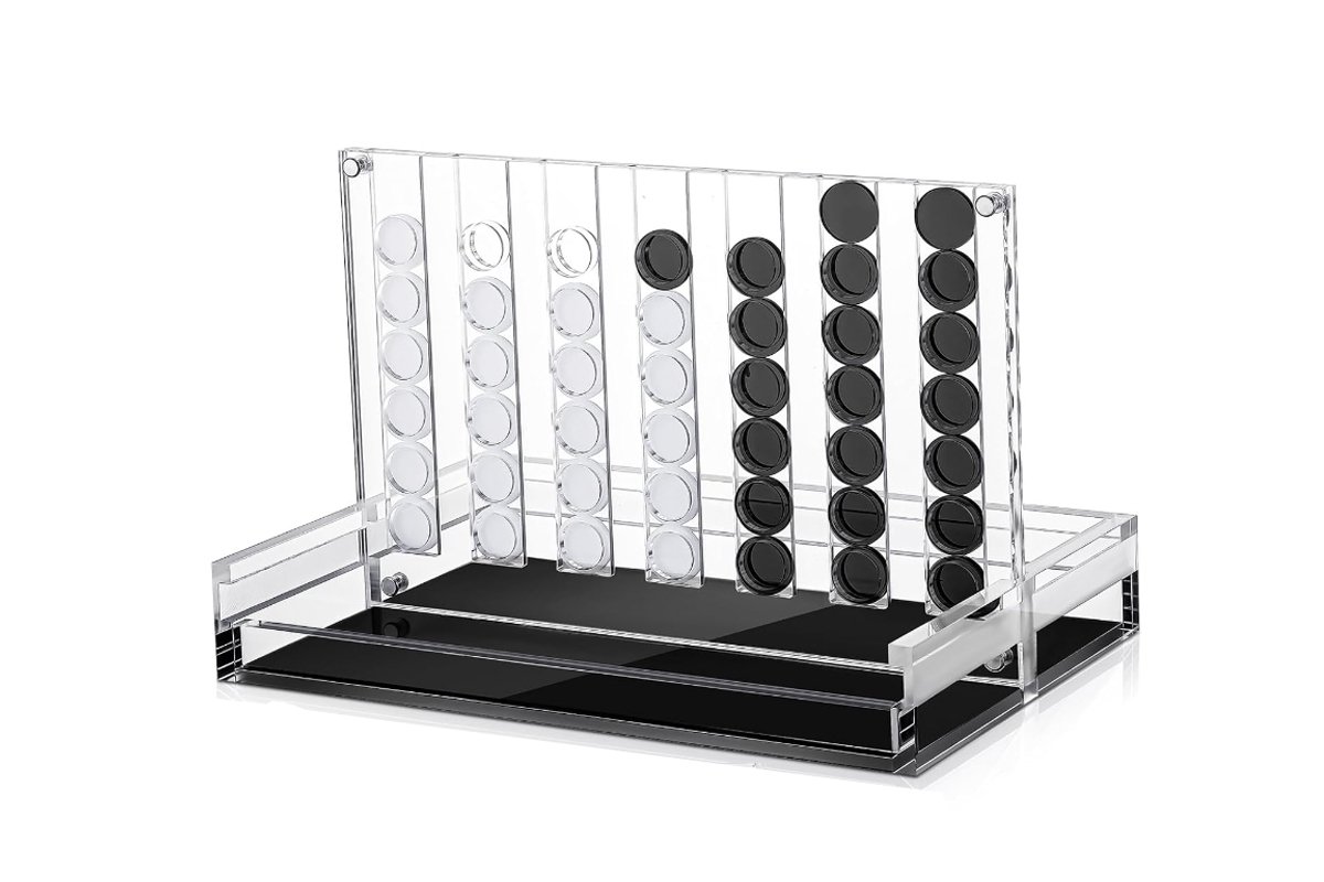 Custom acrylic game pieces being manufactured